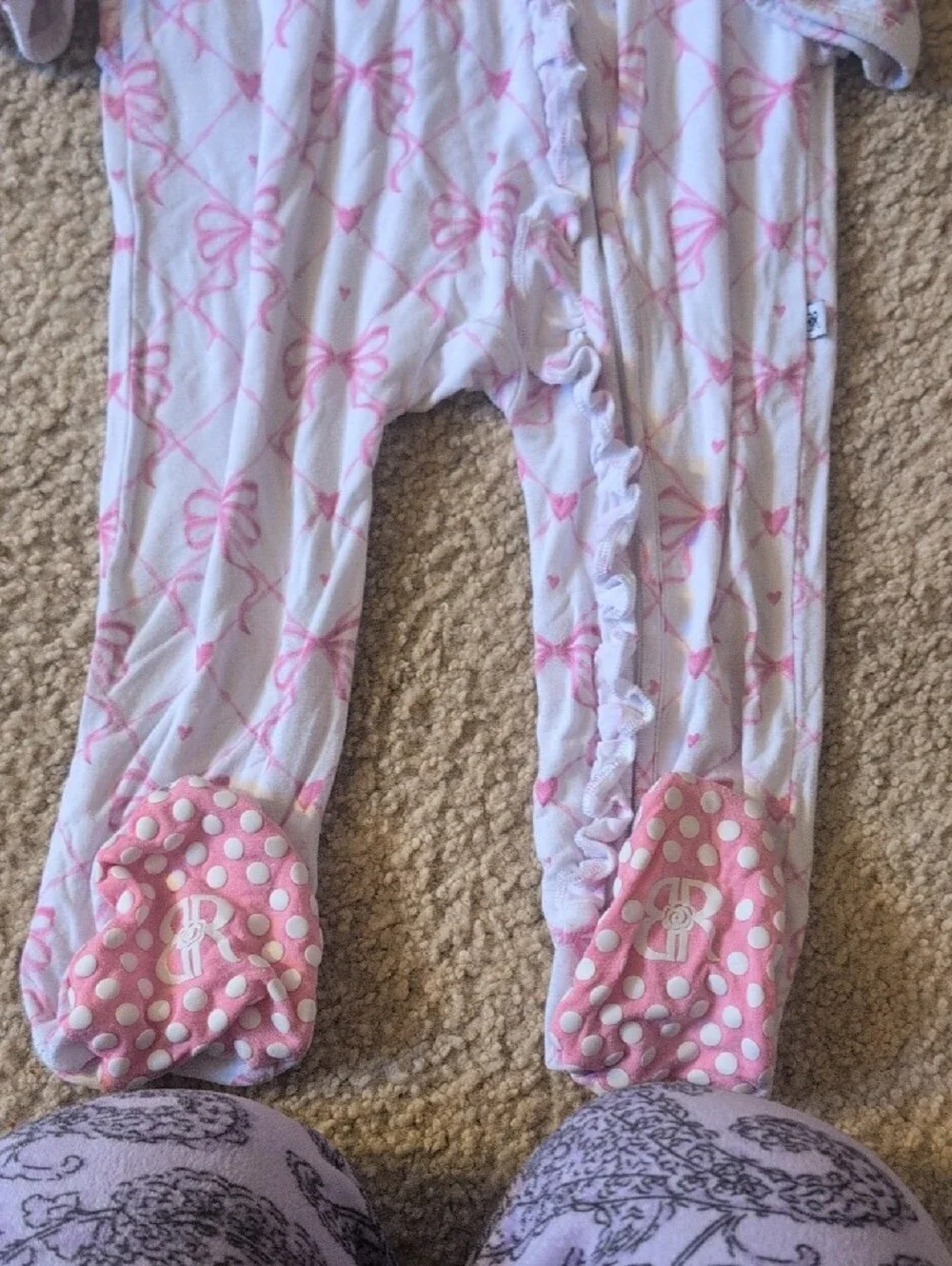 Pink Bow Print Footed One-Piece Pajamas with Front Ruffle Closure